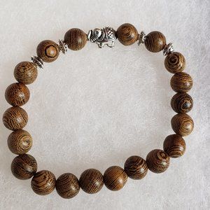 2/15$ NWOT Elephant wood stretch bracelet